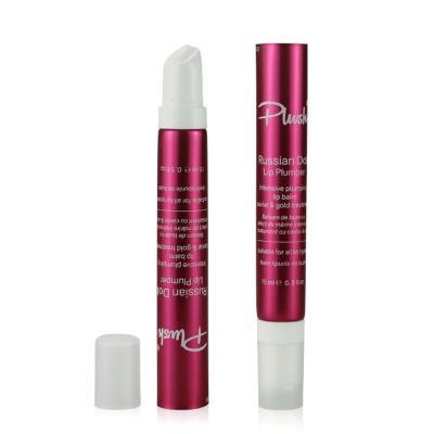 Tube compressible de baume à lèvres rouge de 15 ml avec massage au rouleau pour l'emballage du soin des lèvres
